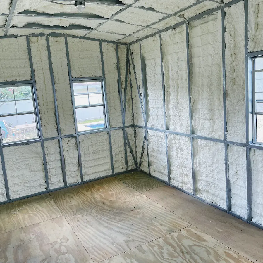Closed-cell spray foam insulation applied to wall cavities in a residential project in New Scotland
